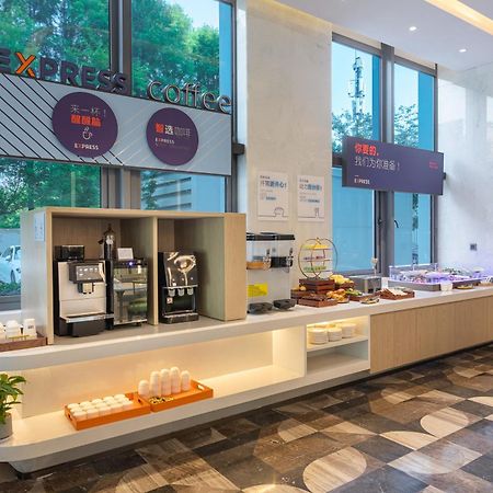 Holiday Inn Express Changfeng Park Шанхай Экстерьер фото