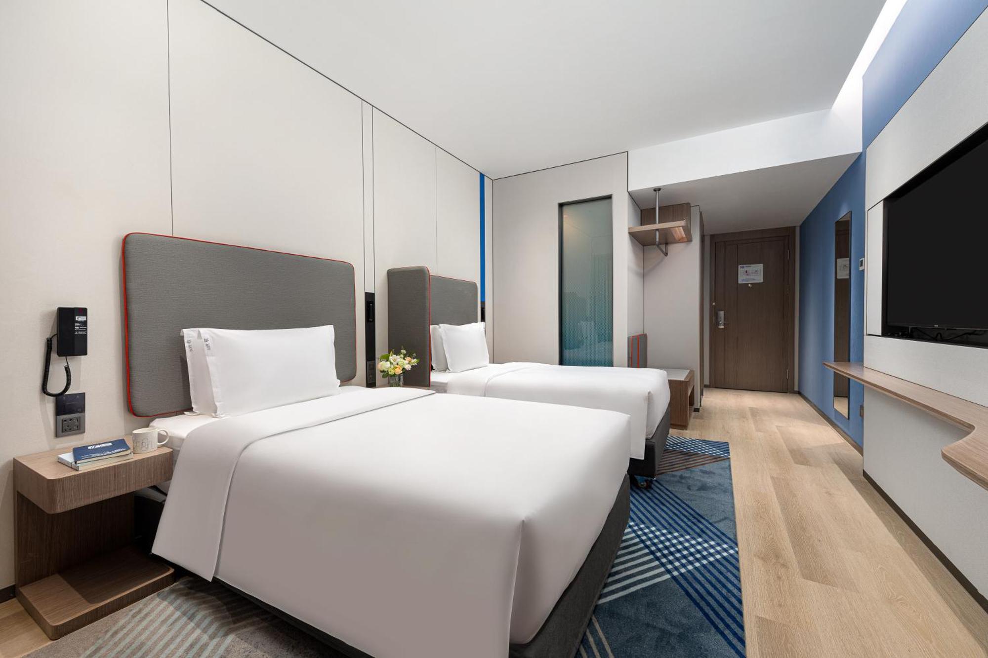 Holiday Inn Express Changfeng Park Шанхай Экстерьер фото