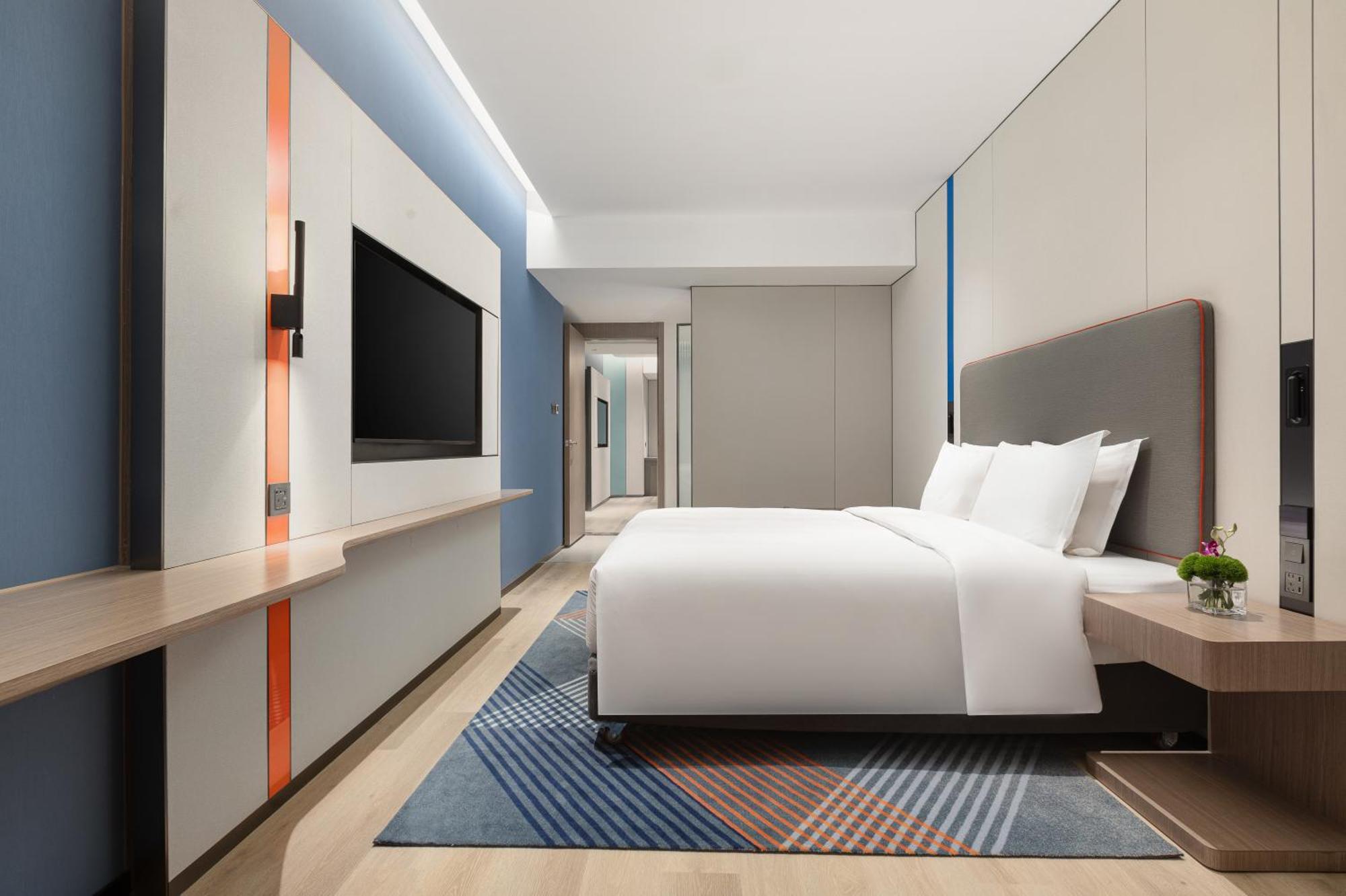 Holiday Inn Express Changfeng Park Шанхай Экстерьер фото