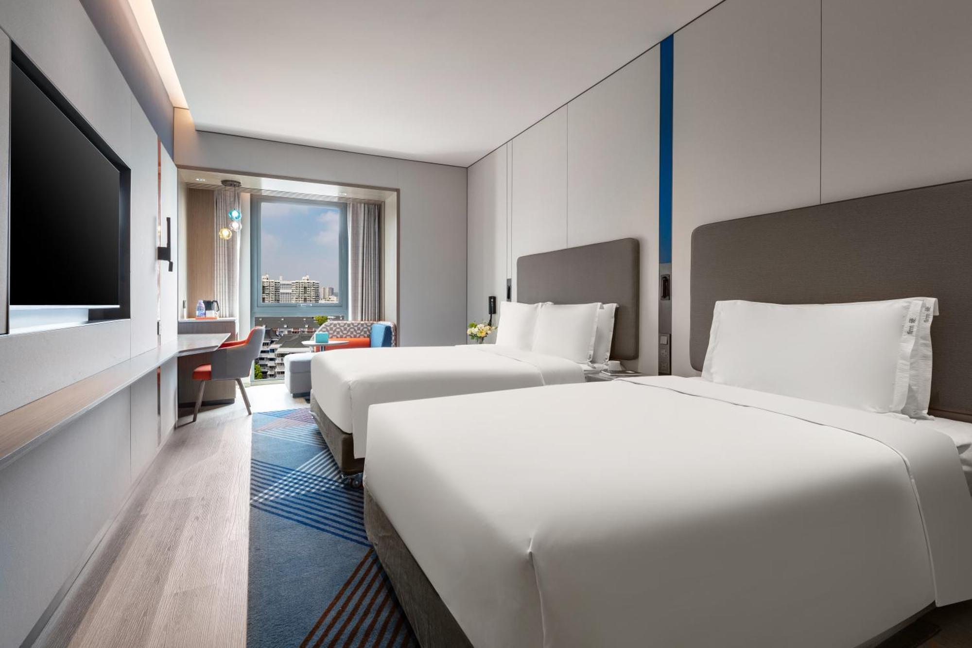 Holiday Inn Express Changfeng Park Шанхай Экстерьер фото